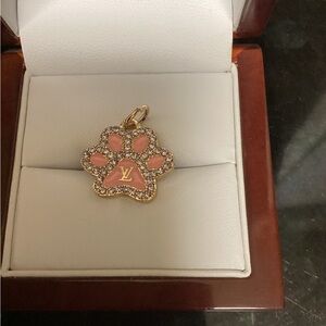 Puppy paw pendant.